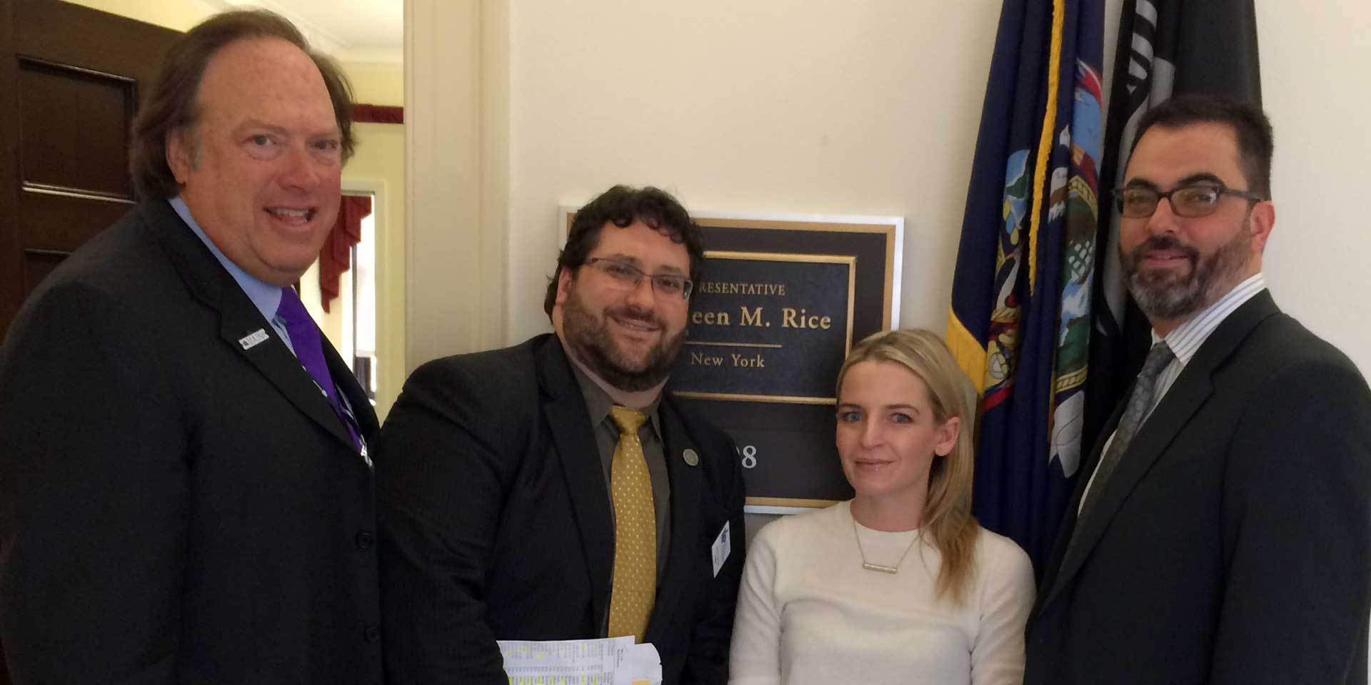 L-R: PIANY past President Jeffrey H. Greenfield; PIANY-YIP President Jason E. Bartow ; Legislative Assistant to Kathleen Rice, D-4, Kate Chiucchini ; and PIANY Director Anthony Kammas.