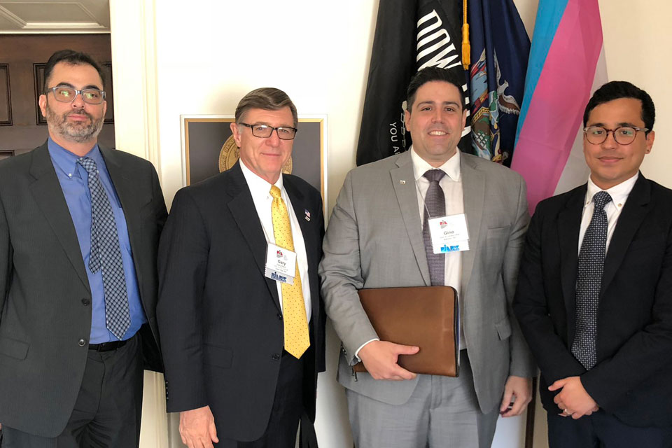 
L-R: PIANY Vice President Anthony Kammas; PIANY Director Gary Slavin, CLTC, CIC; PIANY Secretary Gino A. Orrino, CPIA; and legislative assistant to Rep. Max Rose, D-11, Hector Colon.